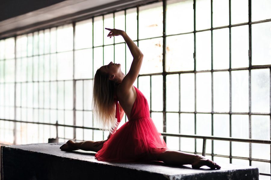 Split on a concrete block, red dress
