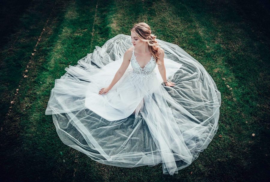 Bridal veil spread on grass, from above
