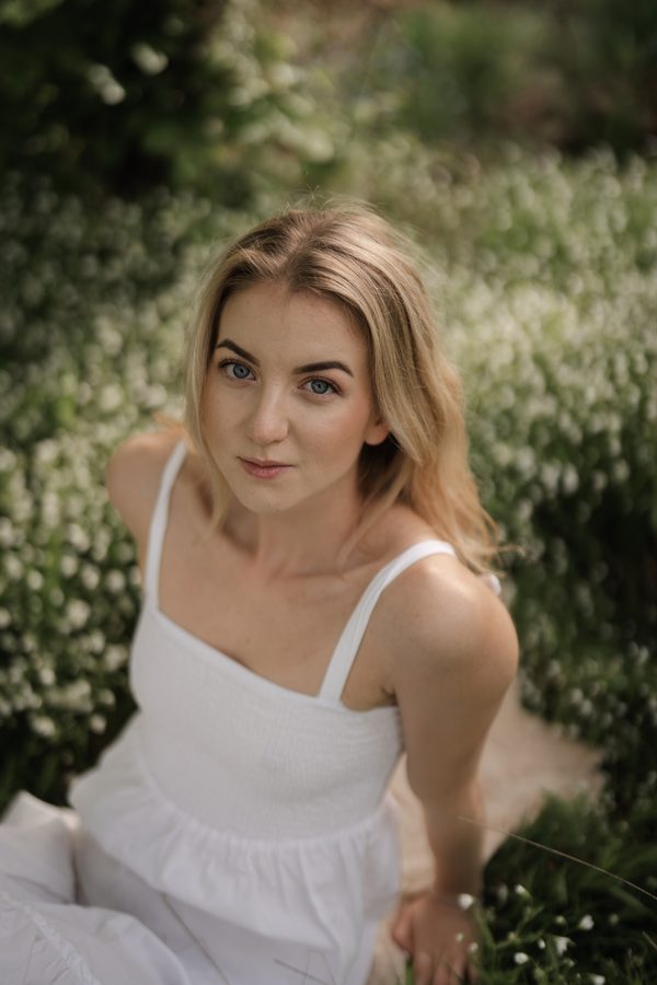 White dress, looking into camera